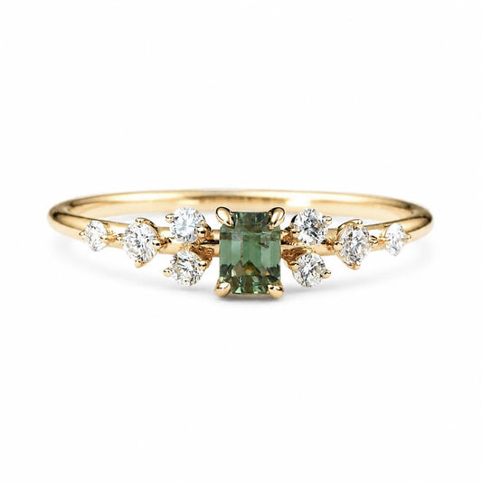 Natural alexandrite ring with a 0.26ct emerald cut alexandrite and diamonds in 18K yellow gold