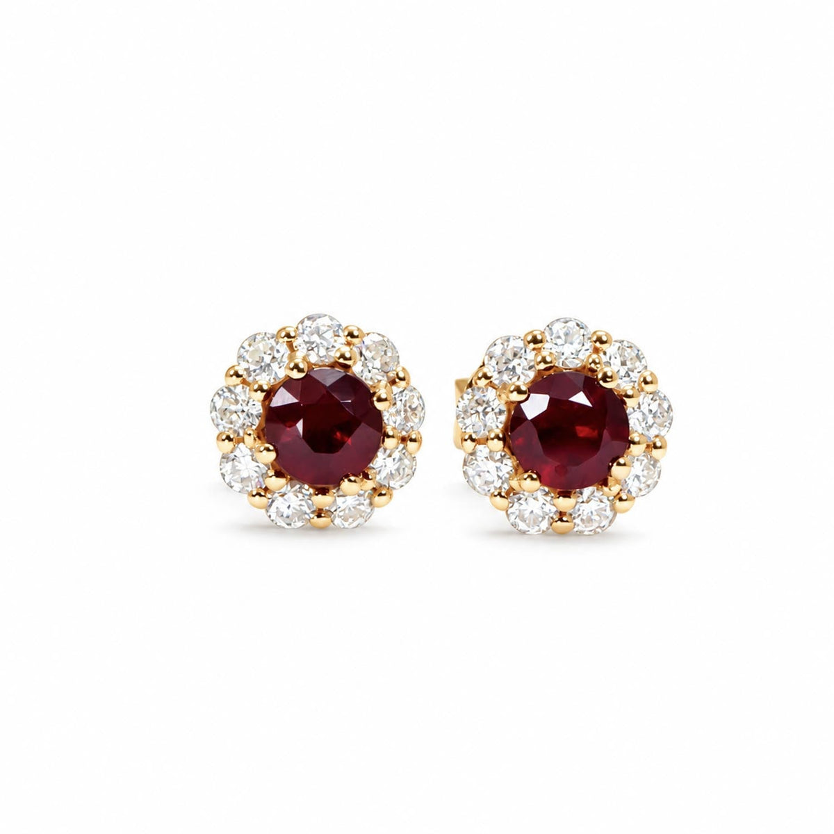 Natural ruby stud earrings with a moissanite halo in 9K yellow gold