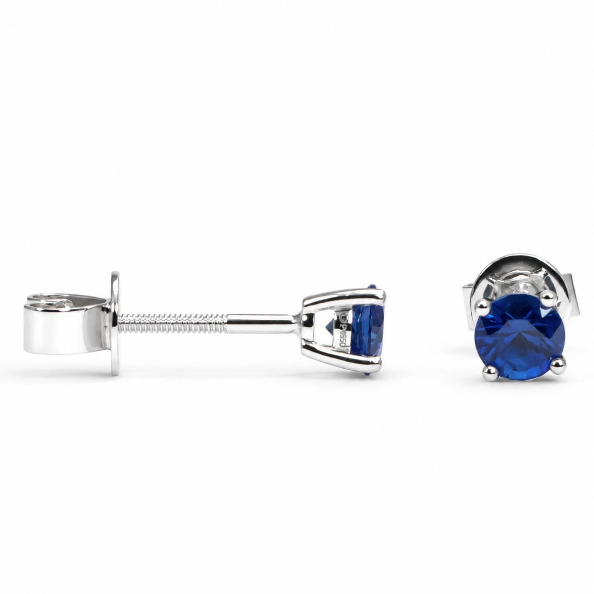 0.73ct round blue sapphire studs in platinum 950 shown at an angle