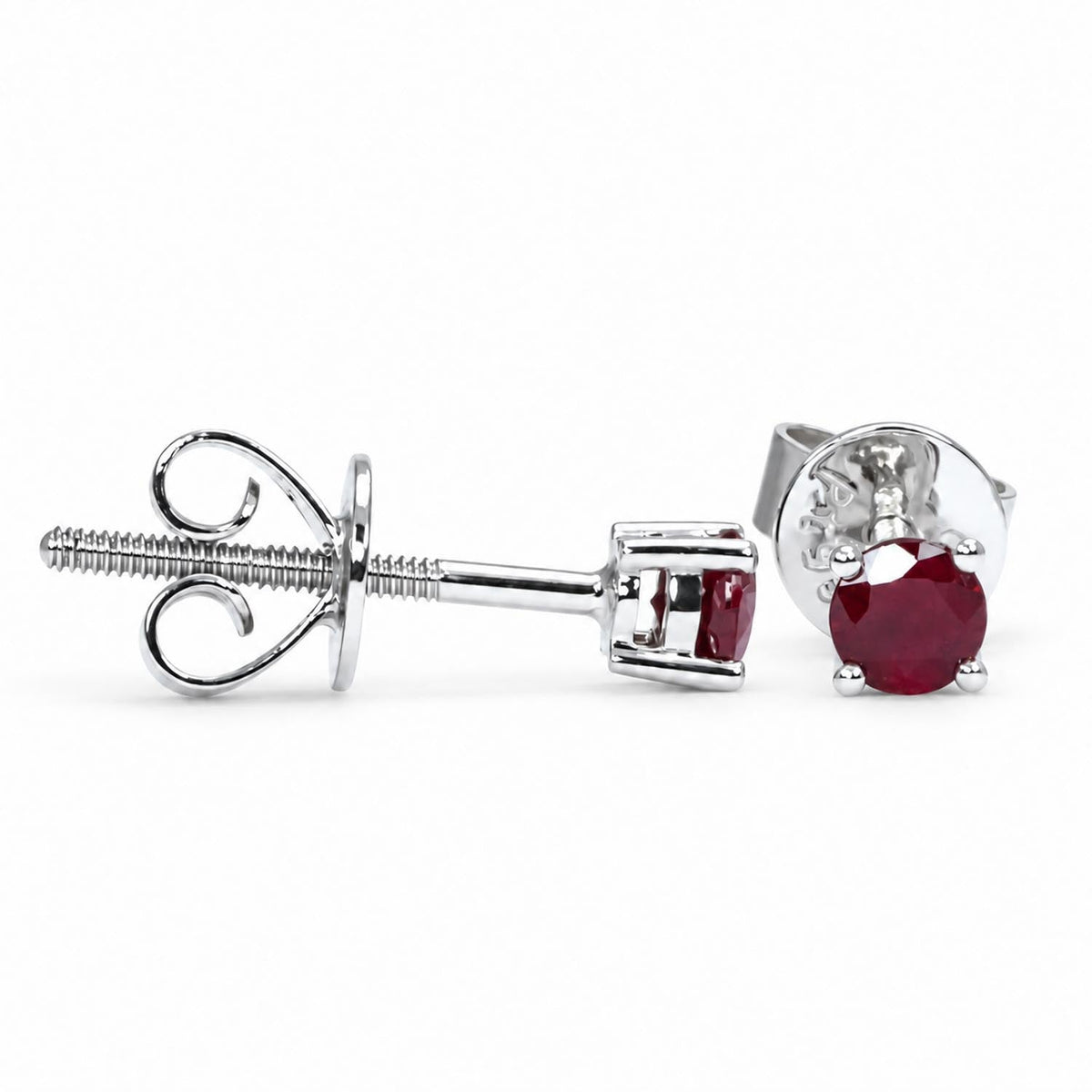 0.34ct natural ruby studs in platinum 950 shown at an angle