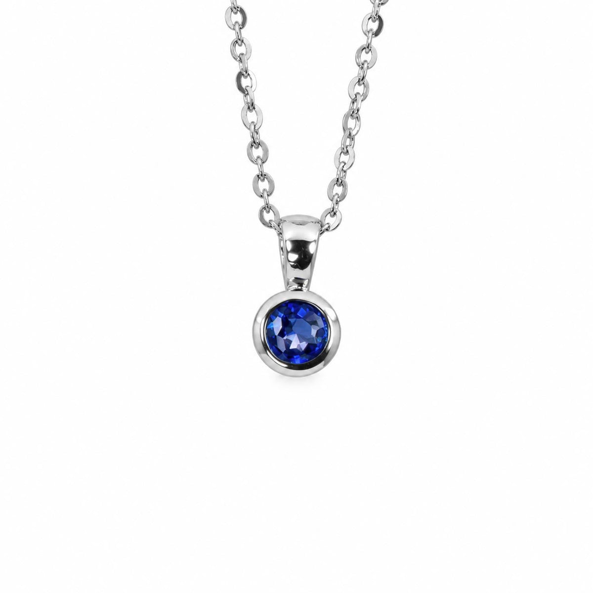 Natural unheated blue sapphire pendant in platinum