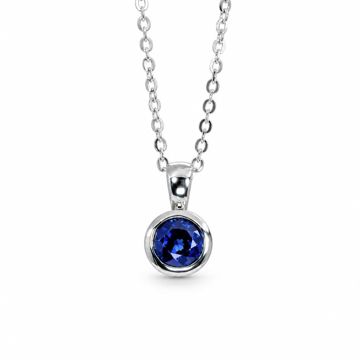 Natural blue sapphire pendant in platinum