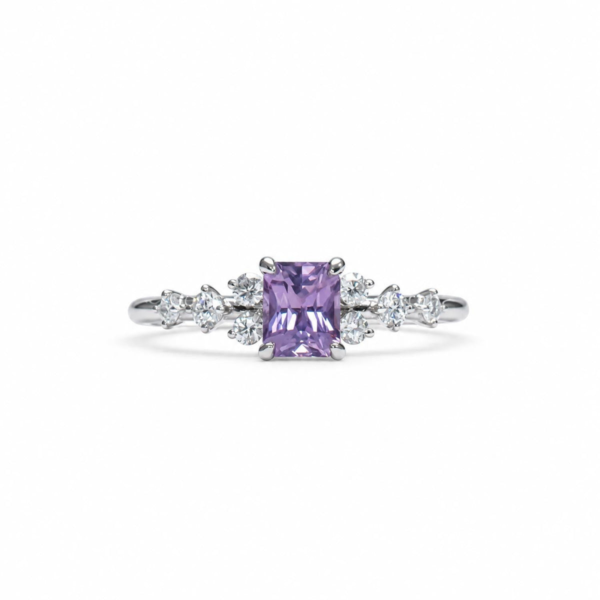 Natural pink sapphire and diamond ring in platinum