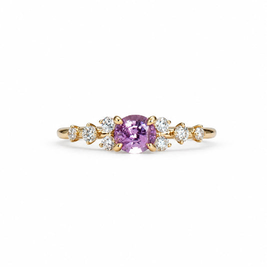 Natural pink sapphire and diamond ring in gold
