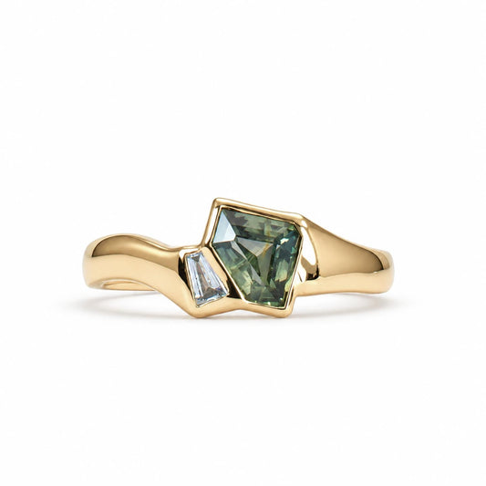 Unique teal sapphire and diamond ring in gold
