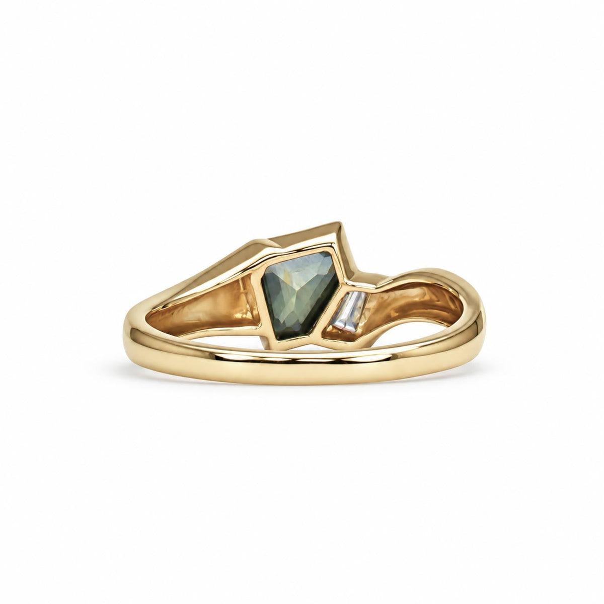 Side profile of the teal sapphire and diamond gold ring