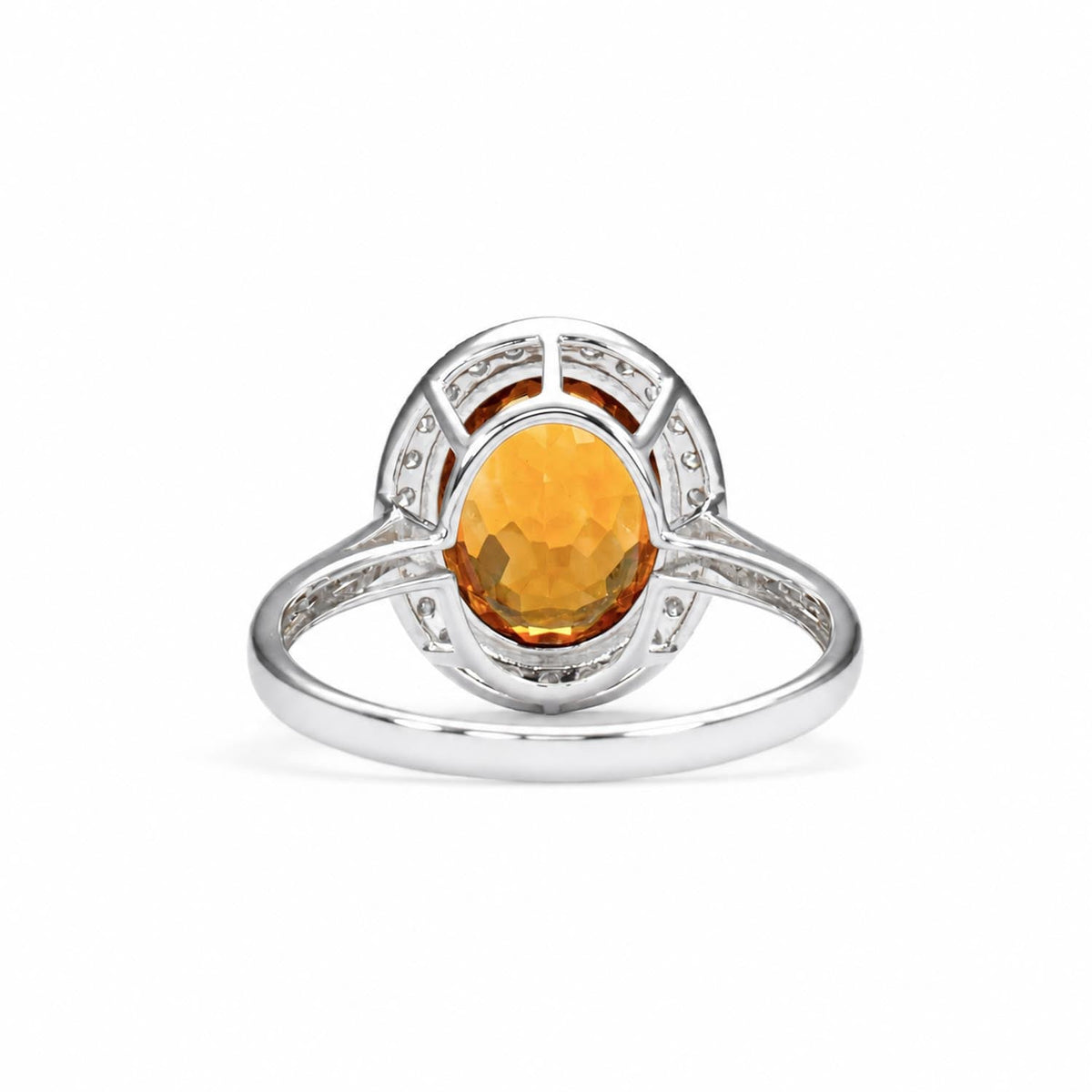Side profile of the oval cut citrine halo ring in 18K white gold