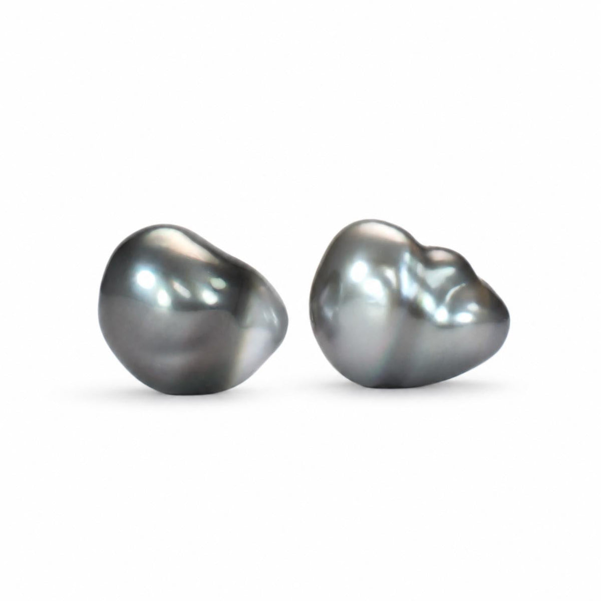 Baroque Tahitian pearl studs in white gold shown at an angle