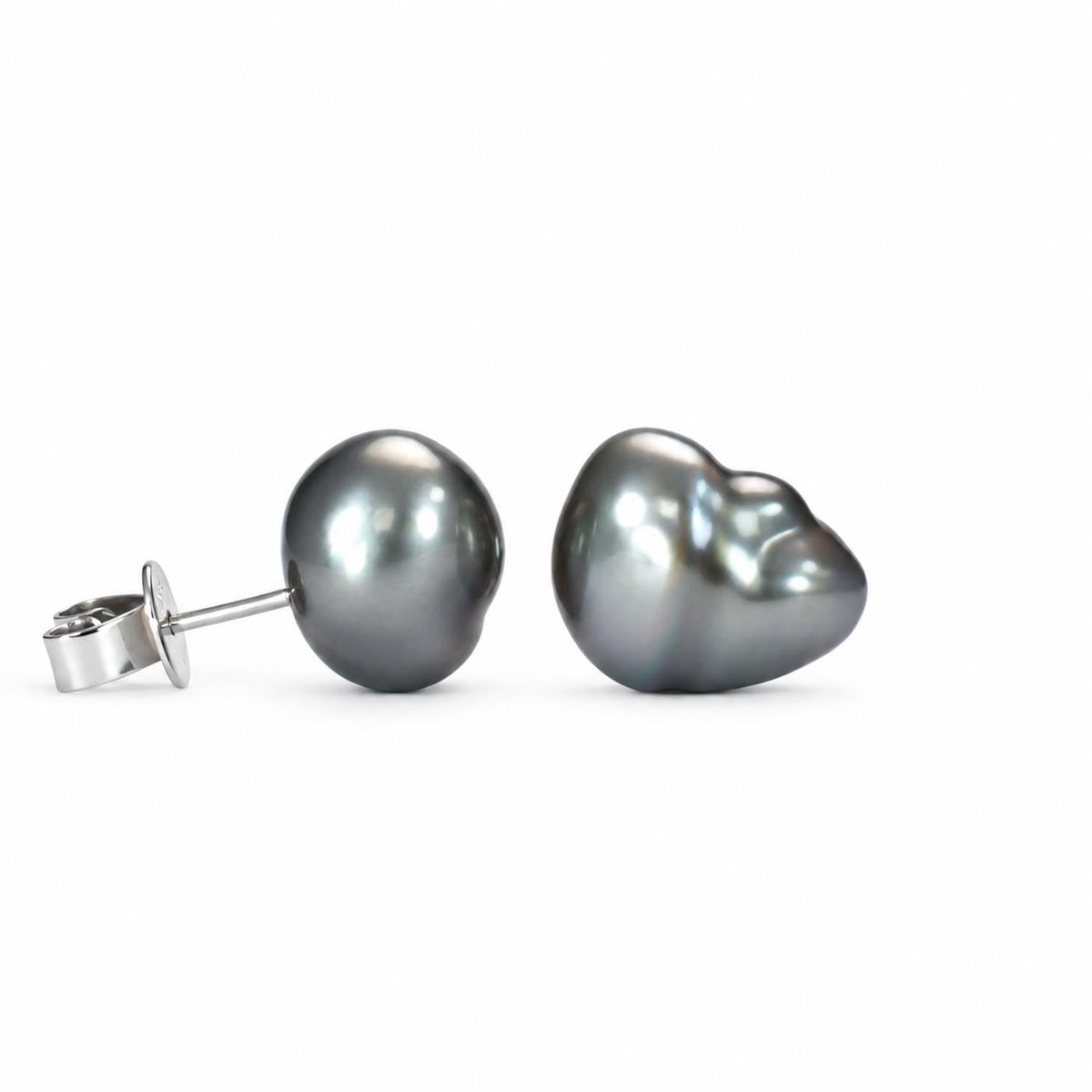 Close detail of the baroque Tahitian pearls in white gold settings