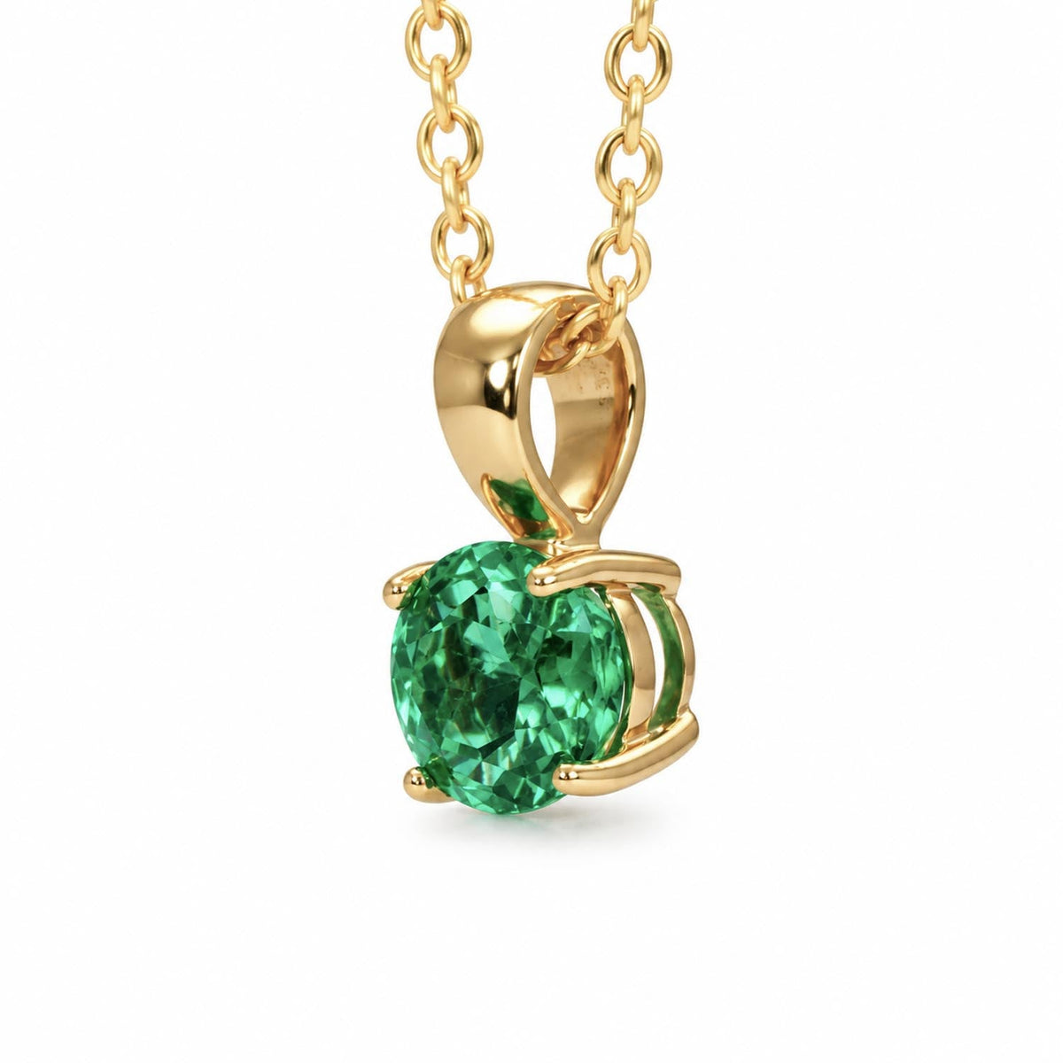Colombian emerald pendant in 18K yellow gold shown at an angle