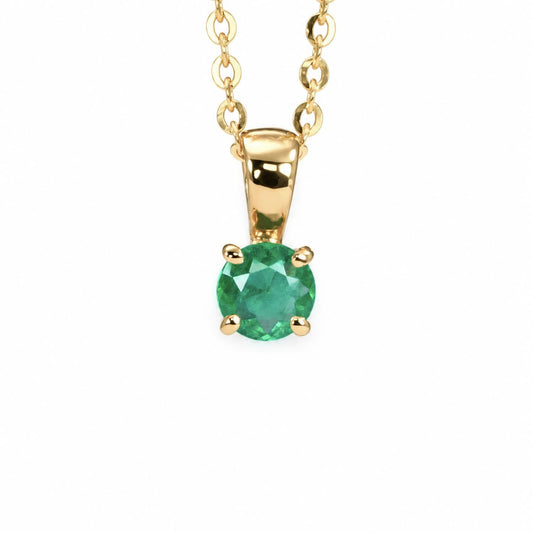 Petite Colombian emerald pendant in 18K yellow gold