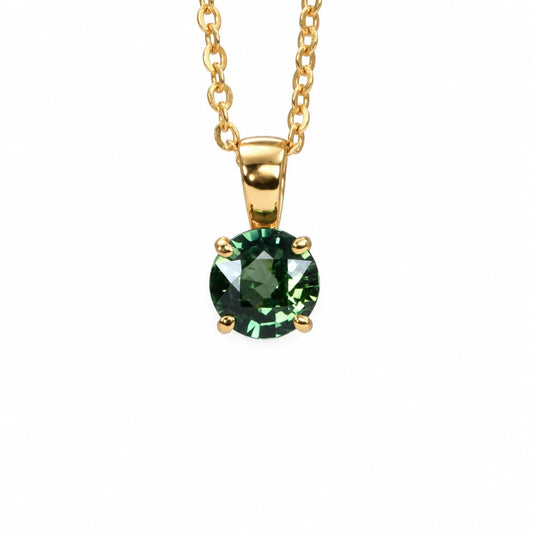 Australian teal sapphire pendant in 18K yellow gold