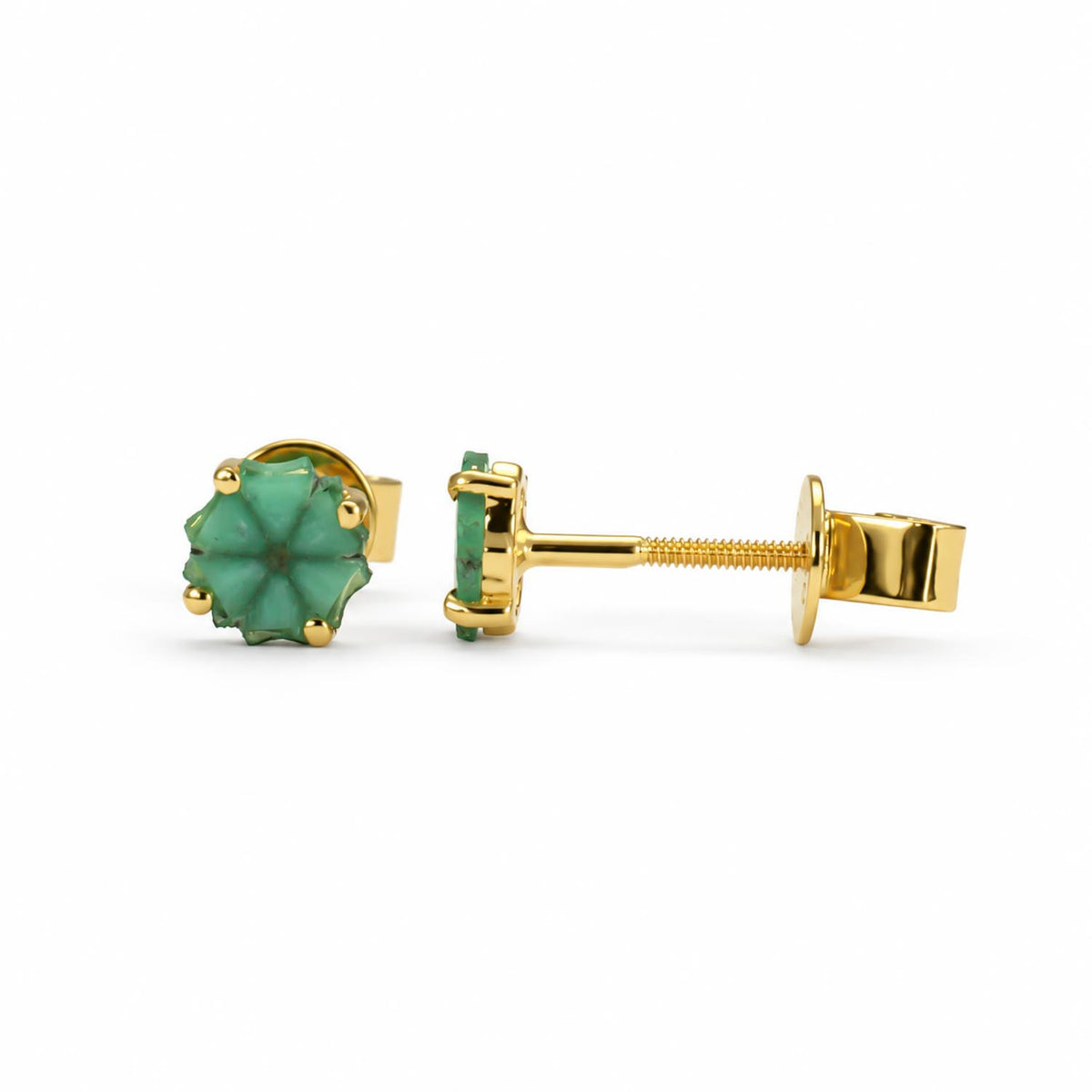 A pair of gold stud earrings with trapiche emeralds, shown on a clean white background. One earring is oriented to show the front of the Colombian emerald, while the other is turned sideways to display the gold post and butterfly back.