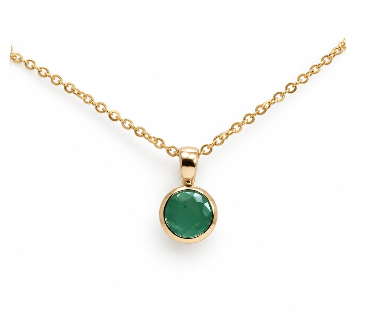 Round Colombian emerald bezel set pendant 0.62ct in 18K yellow gold