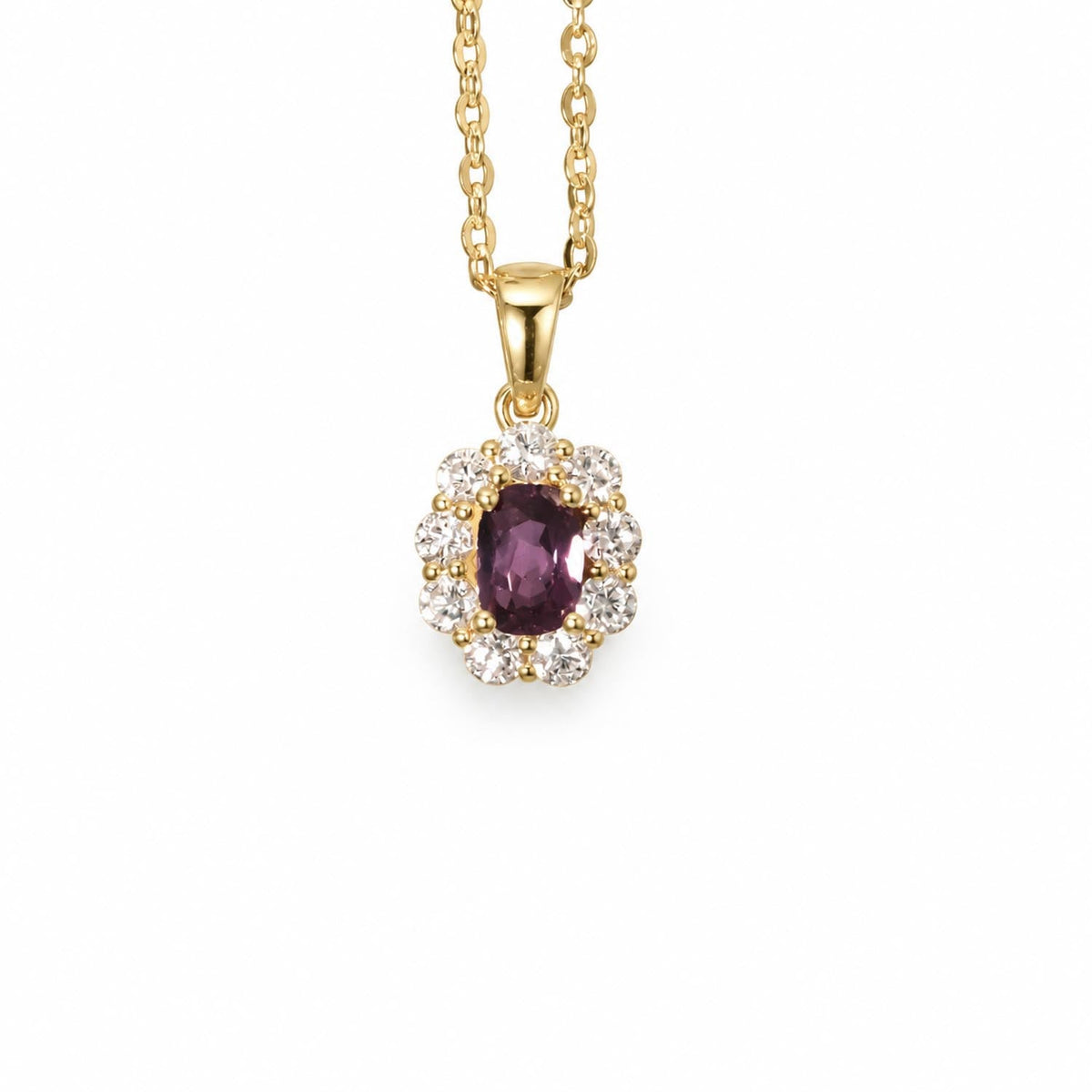 Cushion cut alexandrite halo pendant in 18K yellow gold shown at an angle