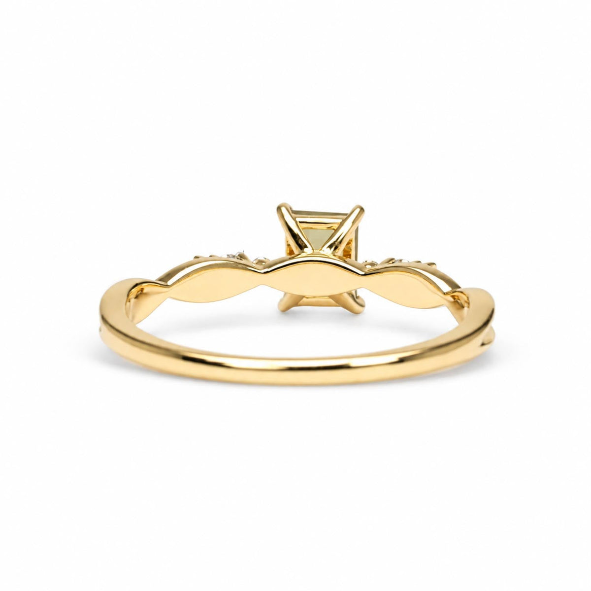 Top view of the alexandrite and diamond ring in 18K yellow gold