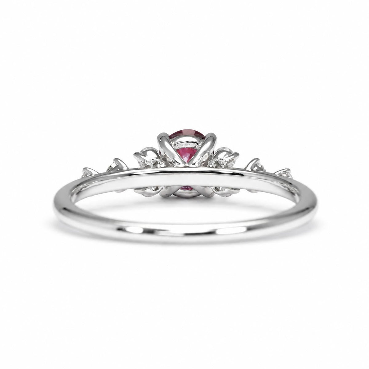 Close detail of the natural oval ruby centre stone in platinum