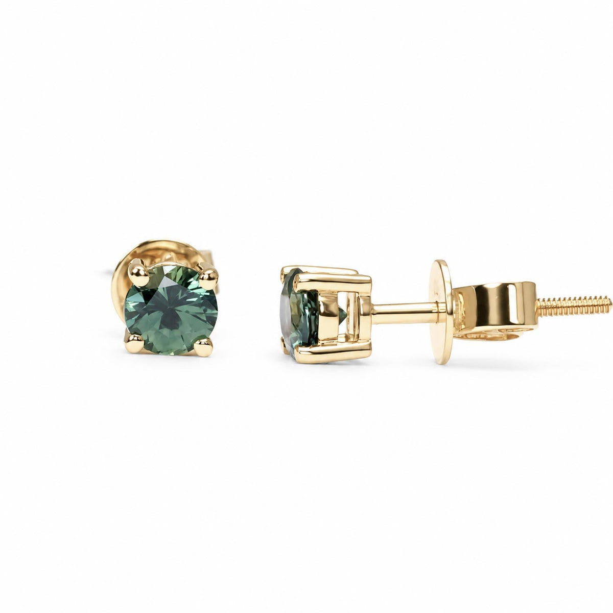 0.79ct round cut Australian sapphire studs in 18K yellow gold, angled view