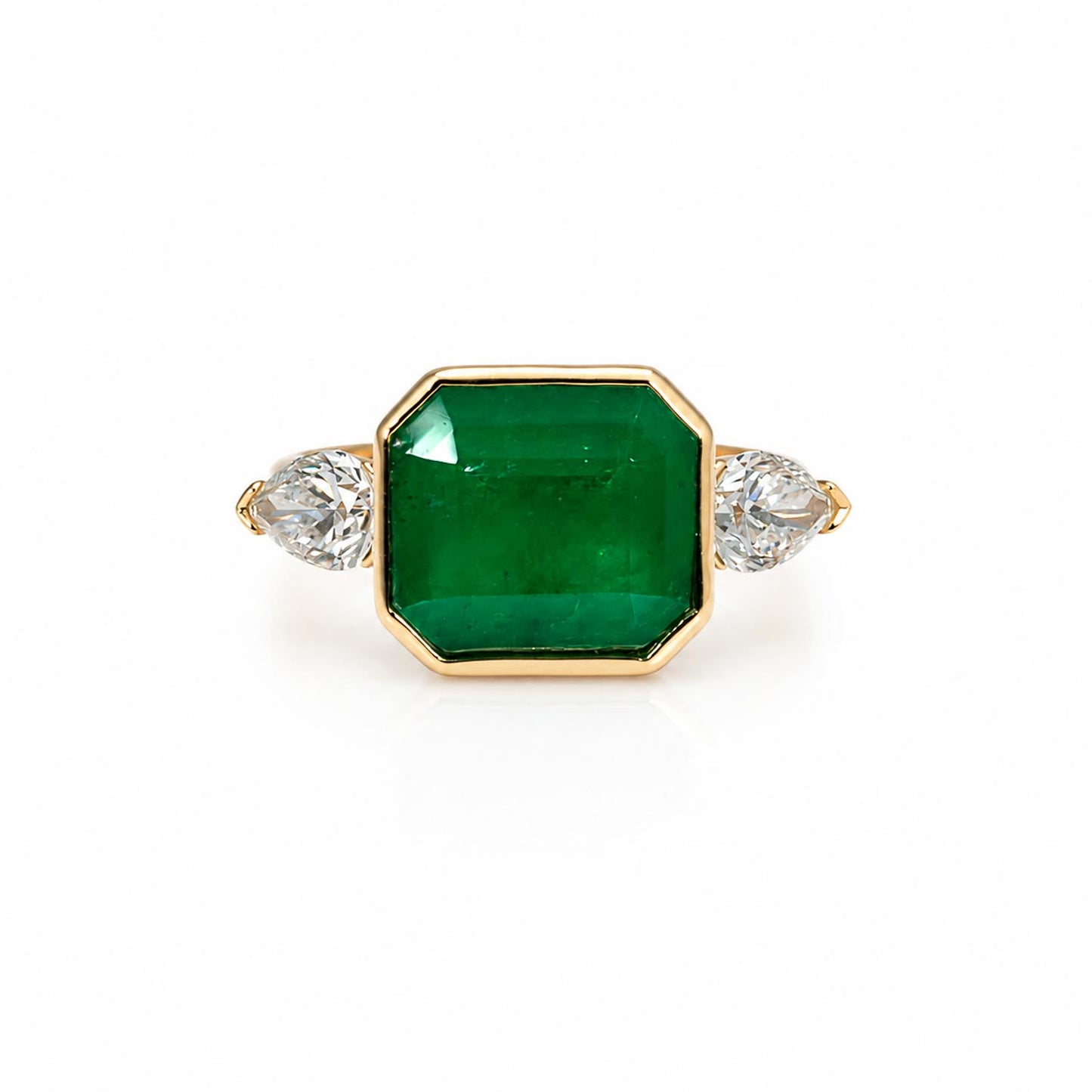 front view of Colombian Emerald and Diamond Ring in 18K Yellow Gold – East West Emerald Cut in white background