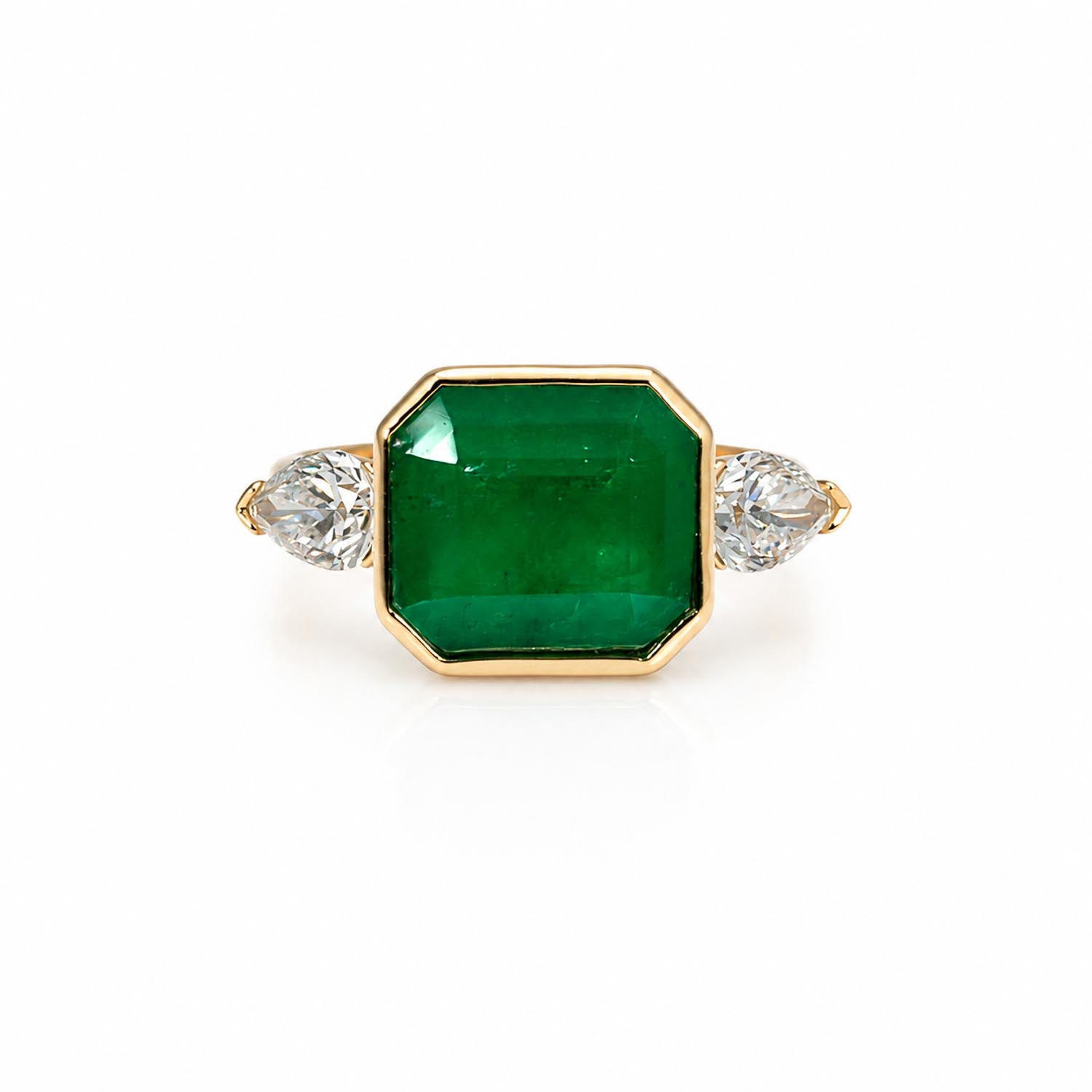 front view of Colombian Emerald and Diamond Ring in 18K Yellow Gold – East West Emerald Cut in white background