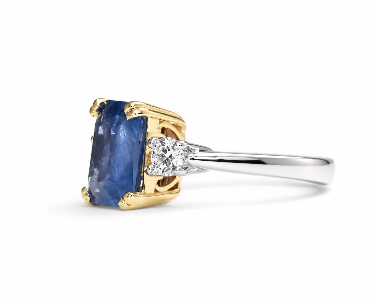 4.60ct unheated blue sapphire ring in platinum and gold shown at an angle