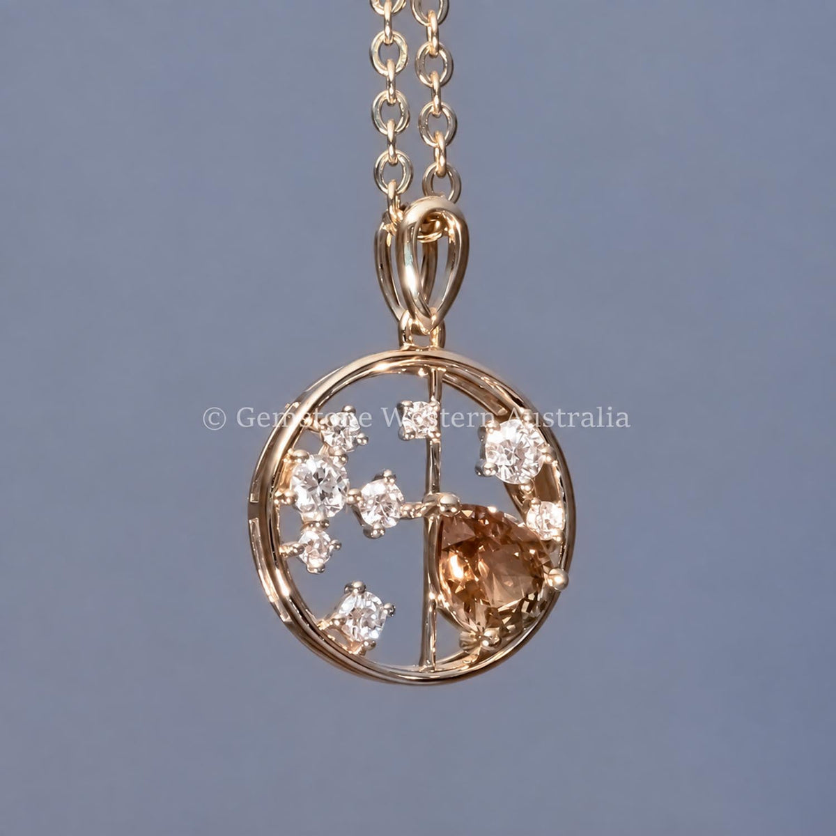 Pear cut alexandrite and diamond pendant in 18K yellow gold, angled view