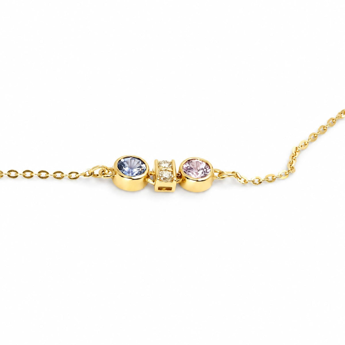 Pink and purple blue sapphire diamond pendant in 18K yellow gold, angled view