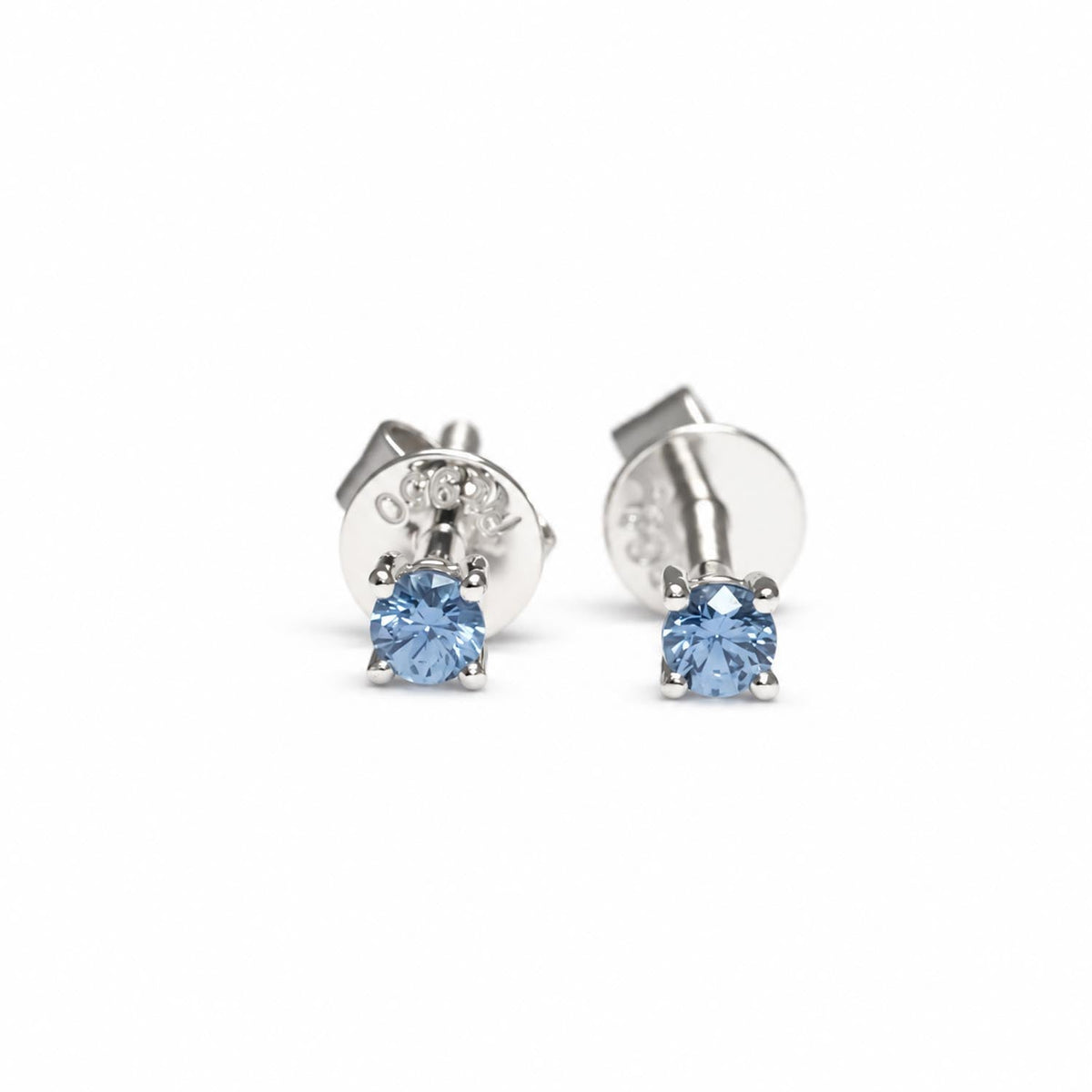 Blue sapphire stud earrings in platinum with 2.5mm round cut sapphires