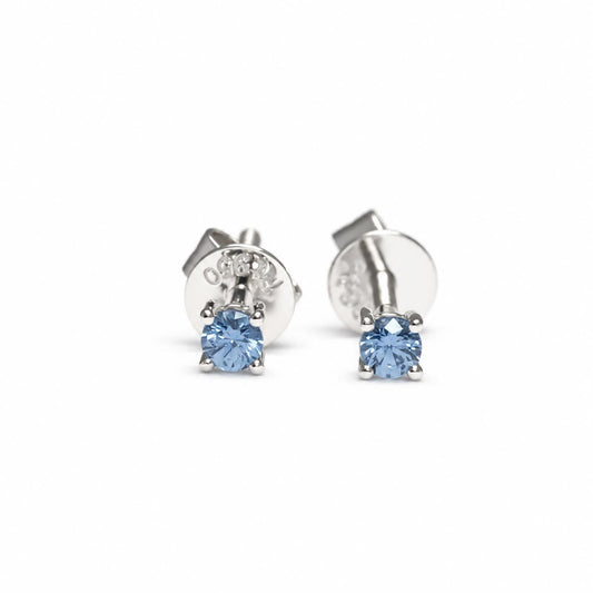 Blue sapphire stud earrings in platinum with 2.5mm round cut sapphires