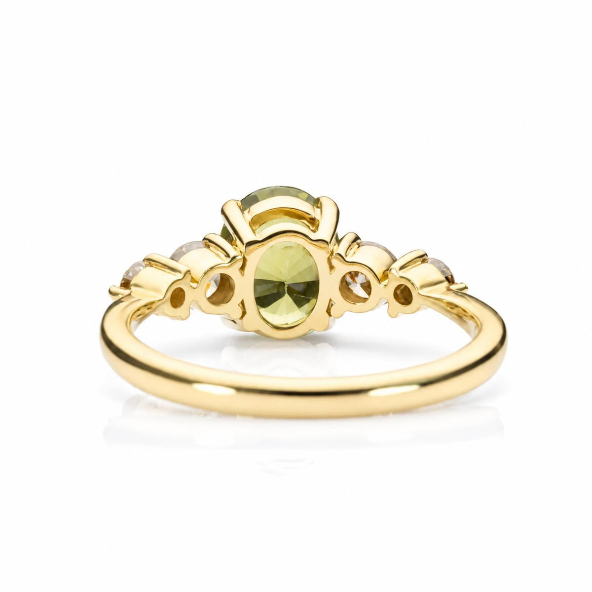 Top view of the green sapphire and Argyle champagne diamond ring