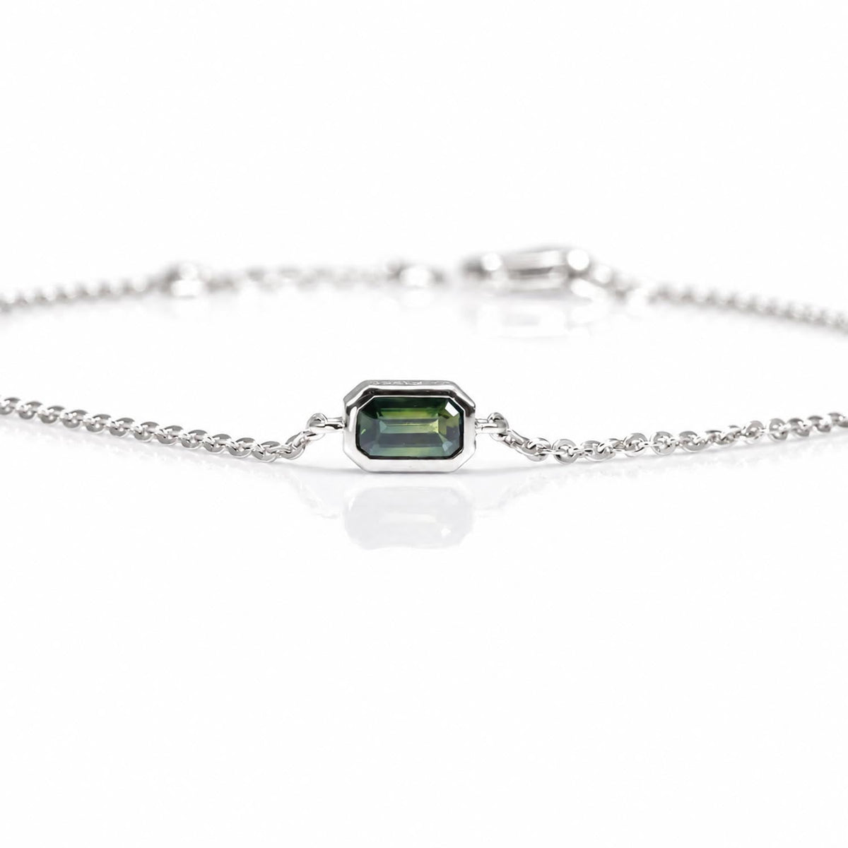 Australian teal sapphire bracelet in platinum with octagon cut sapphires