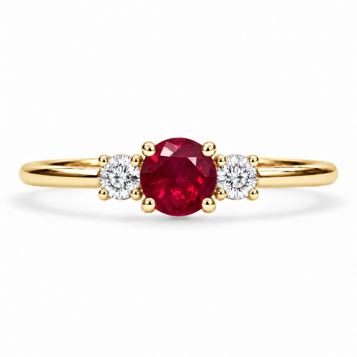 Three stone ruby and diamond ring, claw set in 9K yellow gold