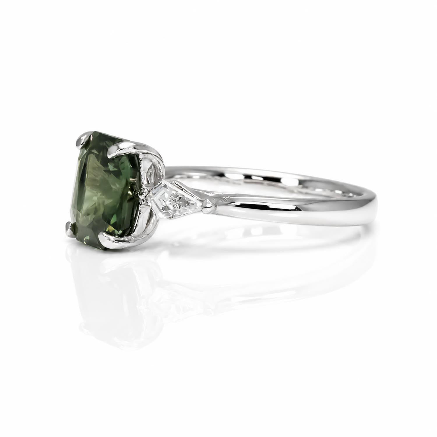 side view of Natural Teal Sapphire & Kite Diamond Ring in Platinum on white background