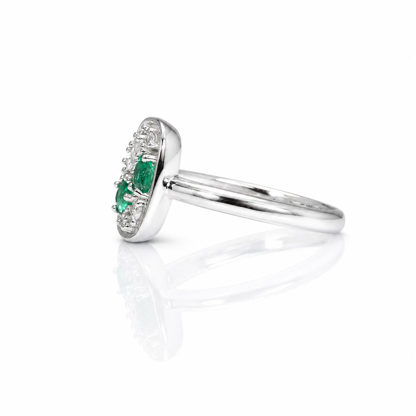 side view of a Natural Colombian Emerald & Diamond Composition Ring in Platinum in white background