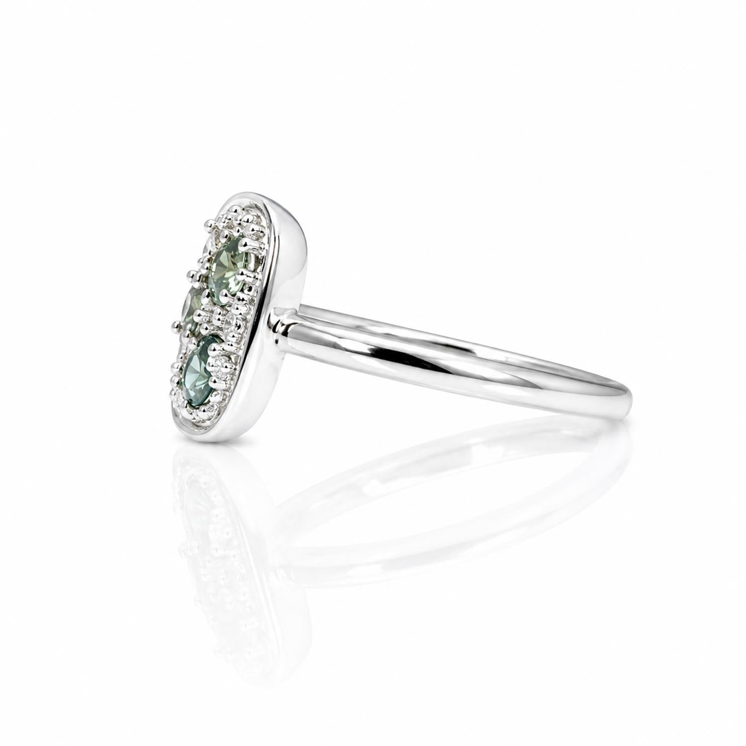 side view of a Natural Alexandrite & Diamond Composition Ring in Platinum on a white background 