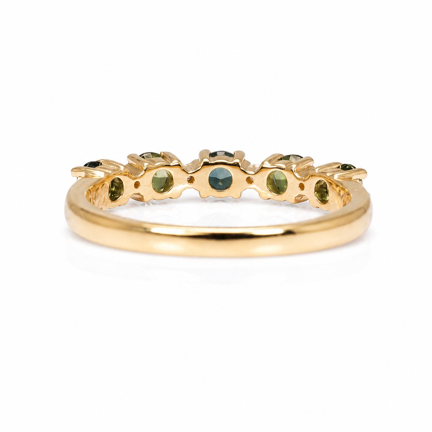 back view of an Australian Teal Sapphire & Diamond Band Ring in 18K Yellow gold in a white background