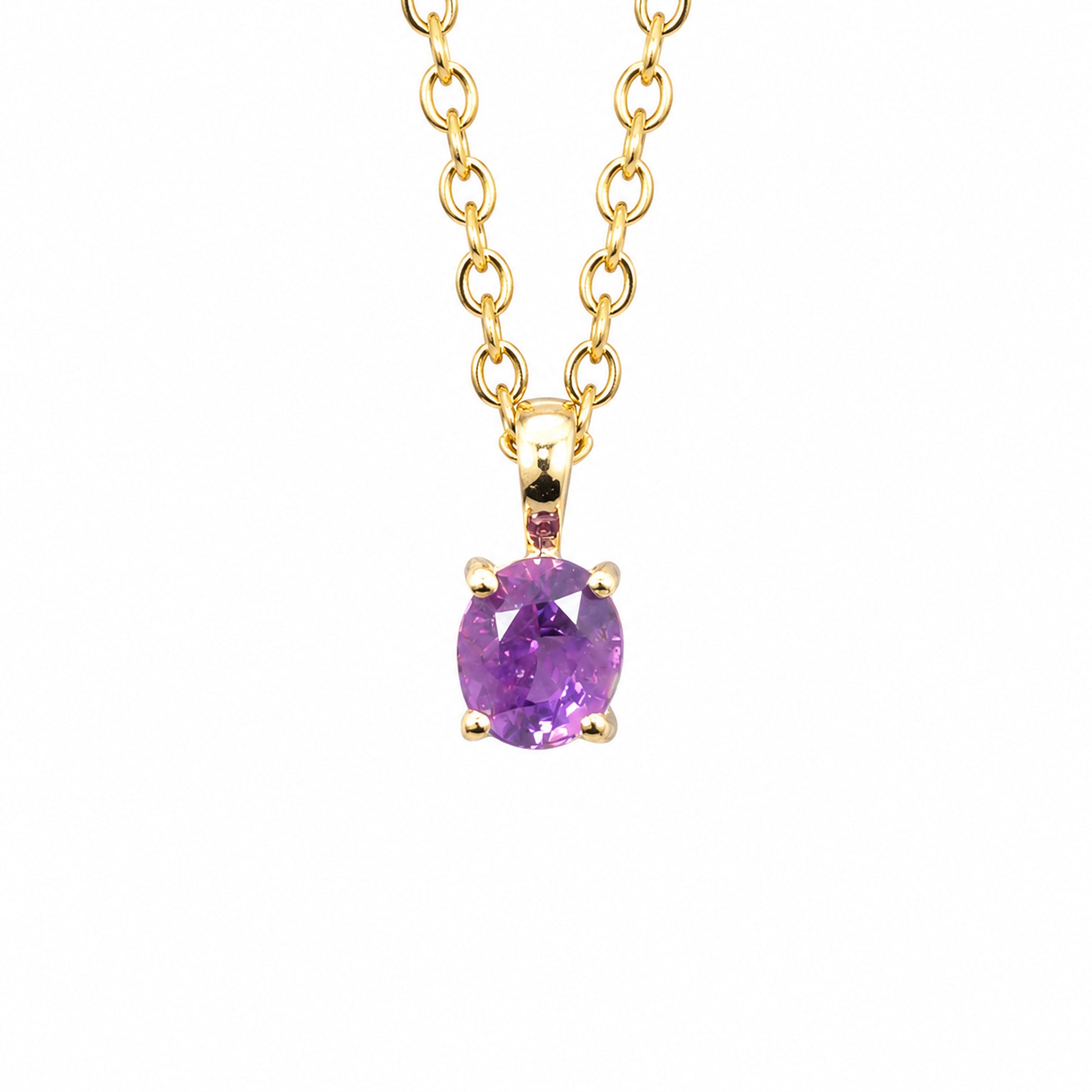 front view of a Natural Unheated Pink Sapphire Pendant in 18K Yellow Gold in a white background