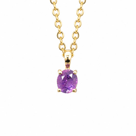 front view of a Natural Unheated Pink Sapphire Pendant in 18K Yellow Gold in a white background