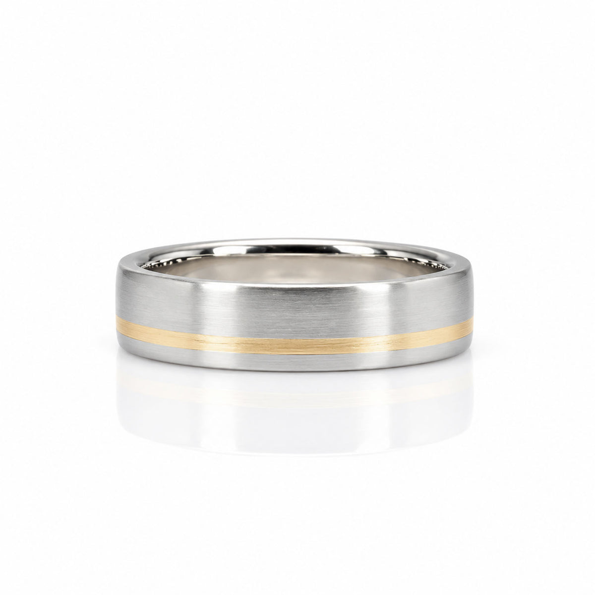 A brushed platinum band ring with a thin gold inlay running horizontally across the band, shown on a clean white background with a soft reflection below.