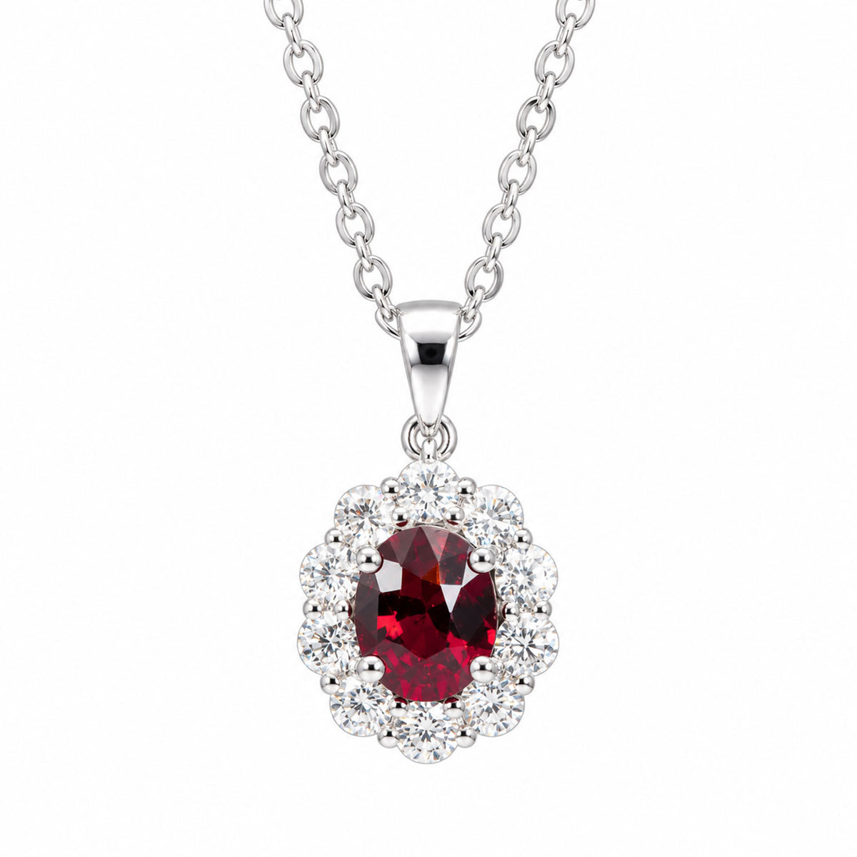 a platinum pendant with a natural ruby surrounded by diamonds attached to a silver chain on a white background