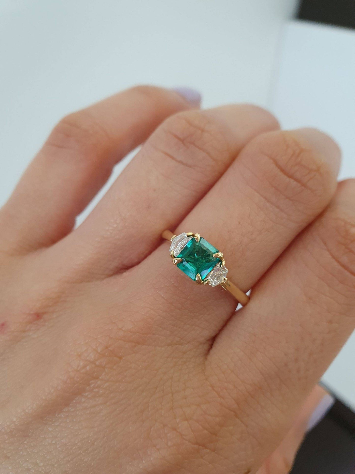 Emerald Cut Emerald and Cadillac Diamonds Three Stone Ring