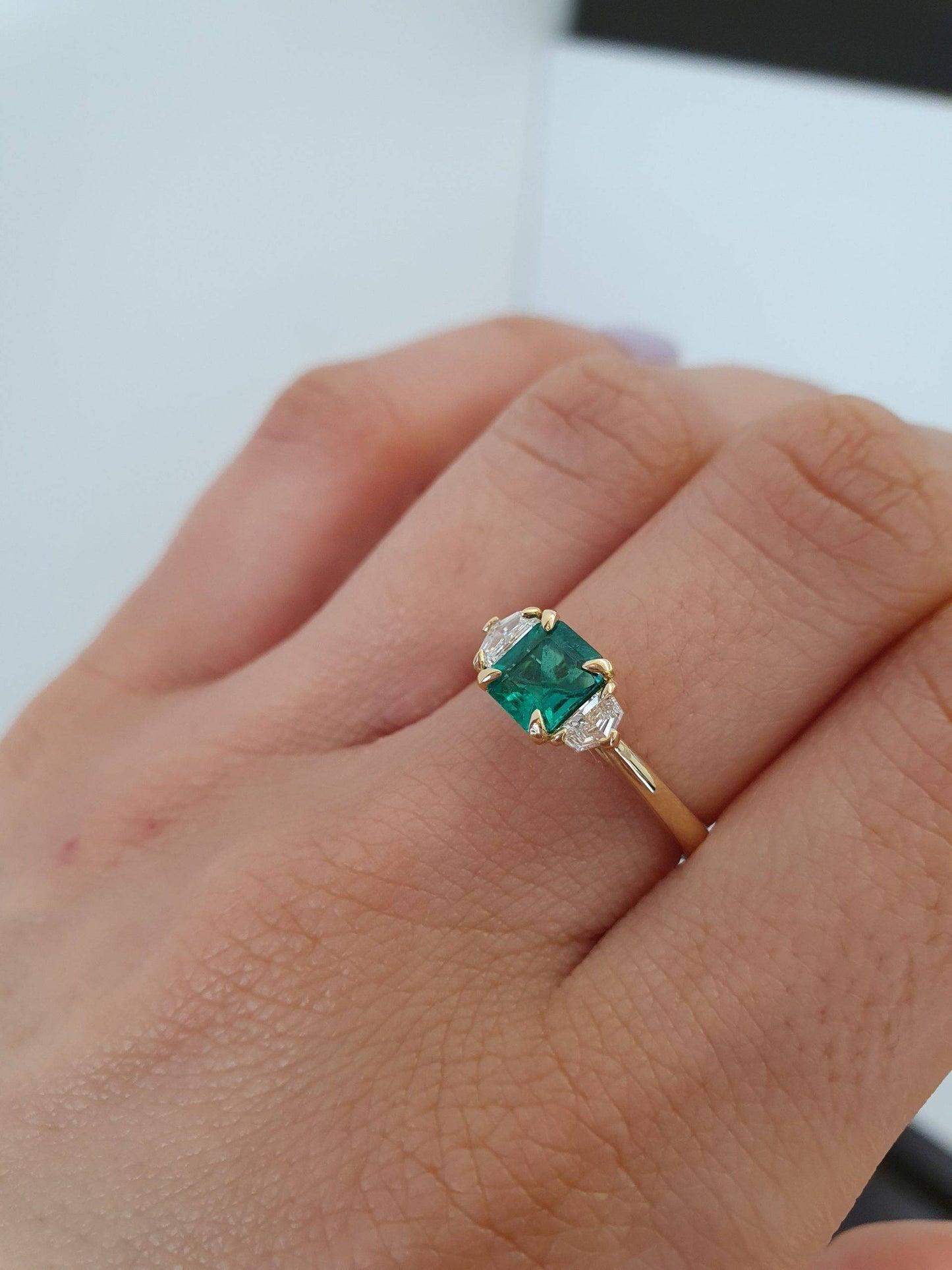 Emerald Cut Emerald and Cadillac Diamonds Three Stone Ring