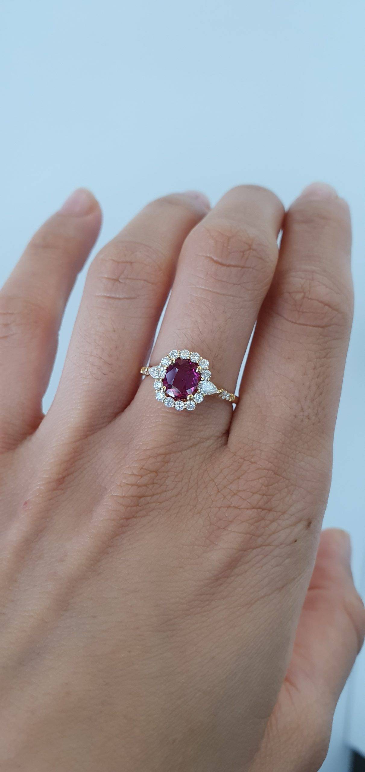 Natural Ruby Ring with Pear-Shaped Diamonds and Halo of Round Diamonds in 18K Yellow Gold | Natural Gemstone Jewellery