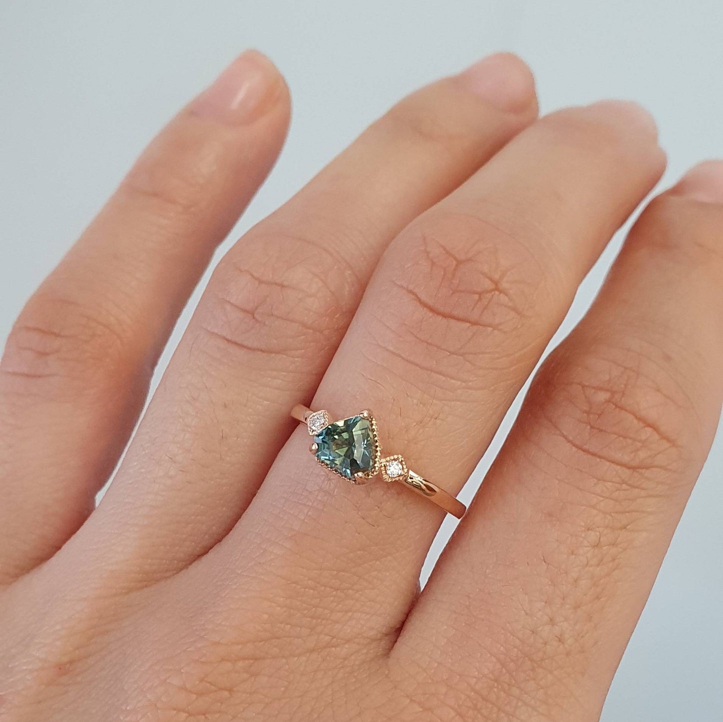 1.02ct Shield Cut Natural Unheated Teal Sapphire Ring in 18K Rose Gold with Diamonds