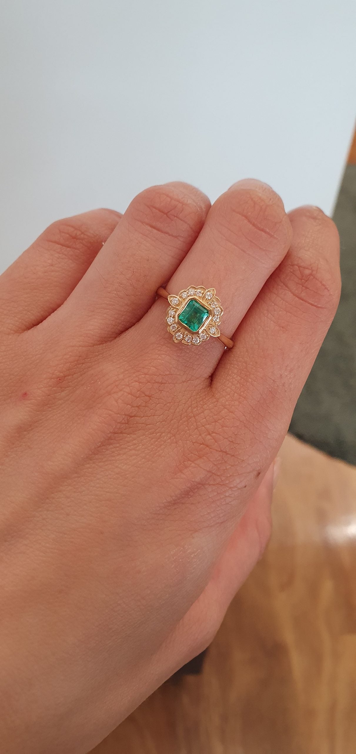 Art Deco Inspired Colombian Emerald Ring with Diamond Halo in 18K Yellow Gold