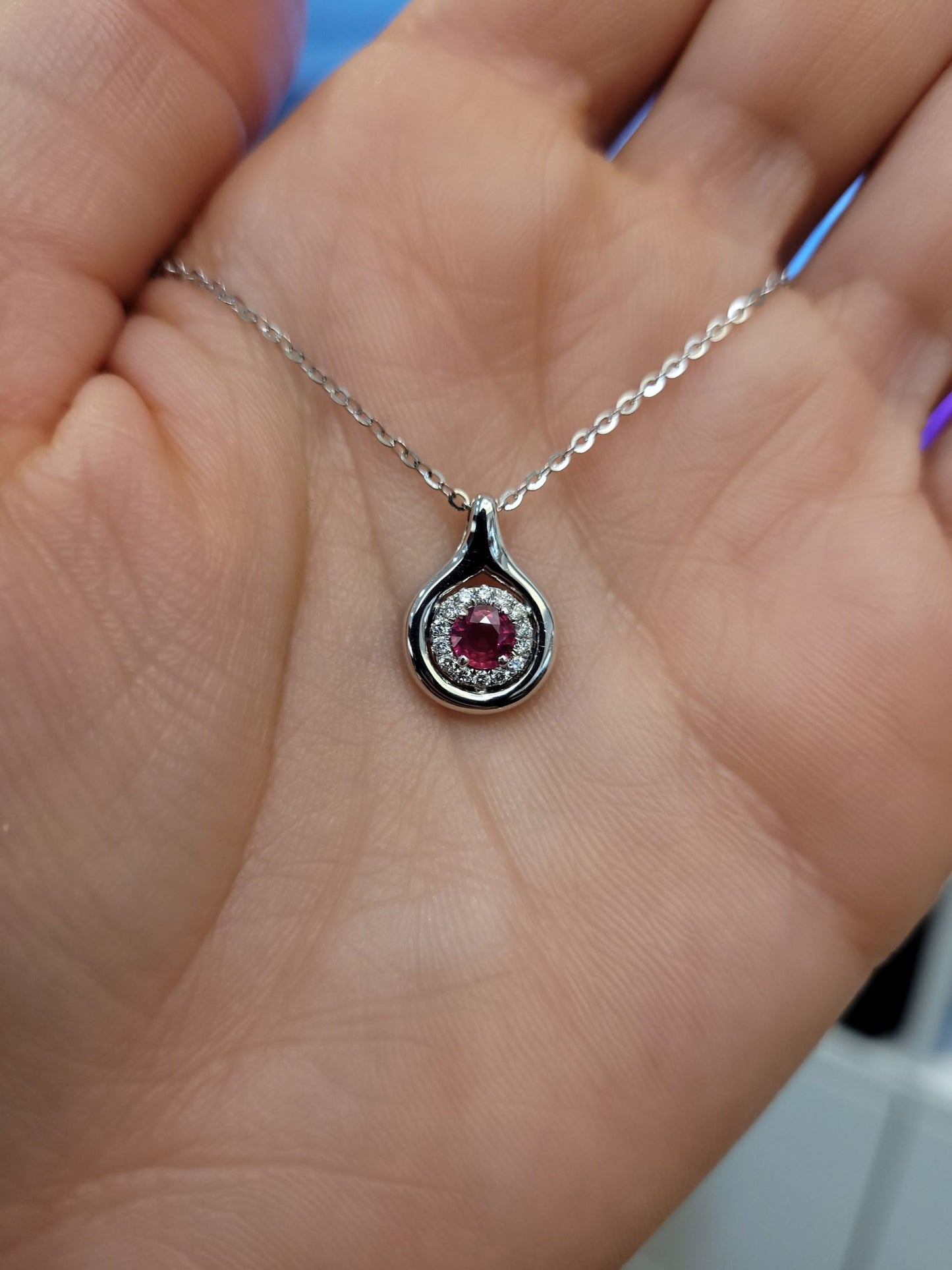 Round Ruby and Diamond Halo Pendant in White Gold