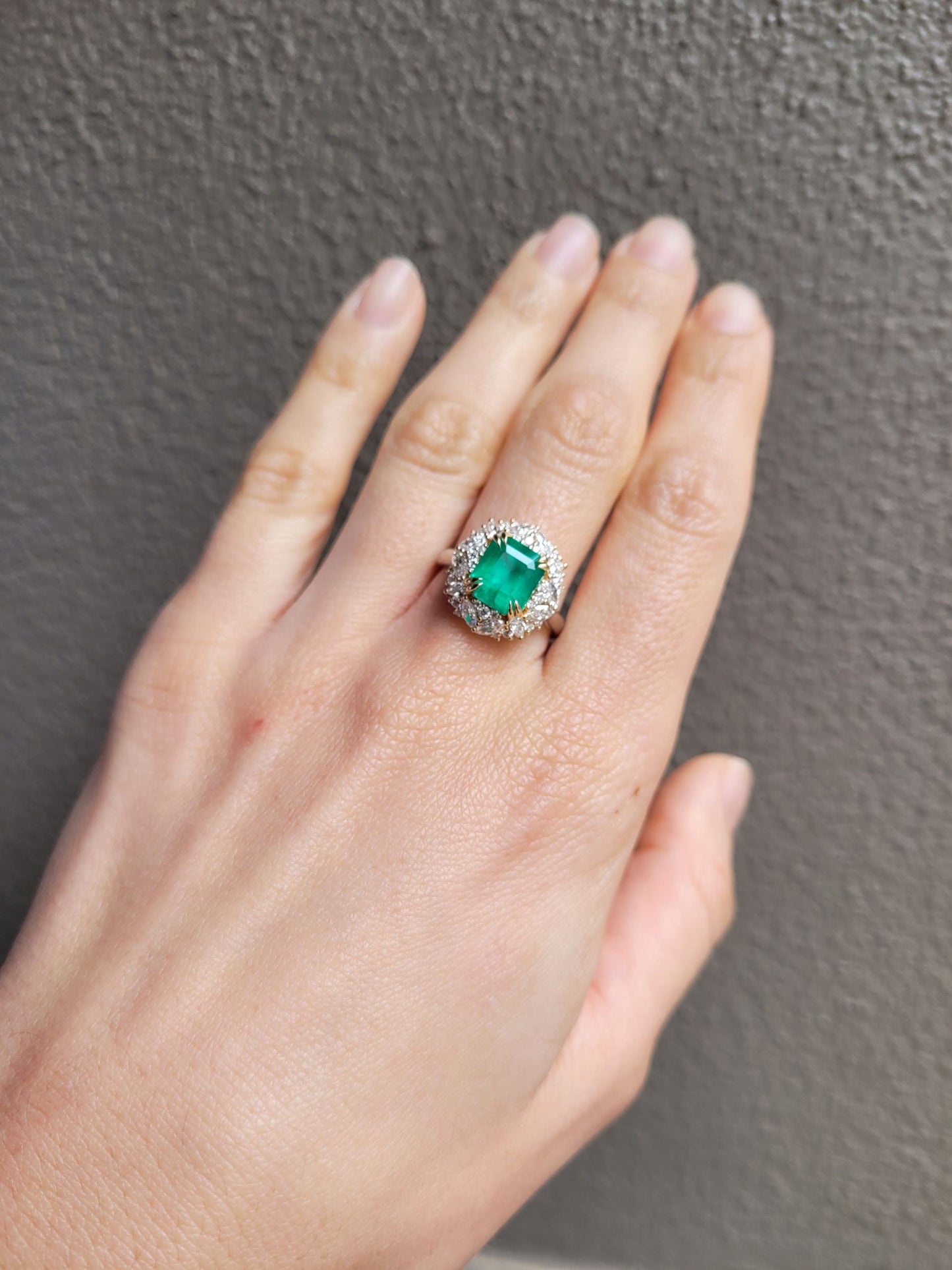 Emerald Statement Ring with Diamond Halo in 18K Gold and Platinum