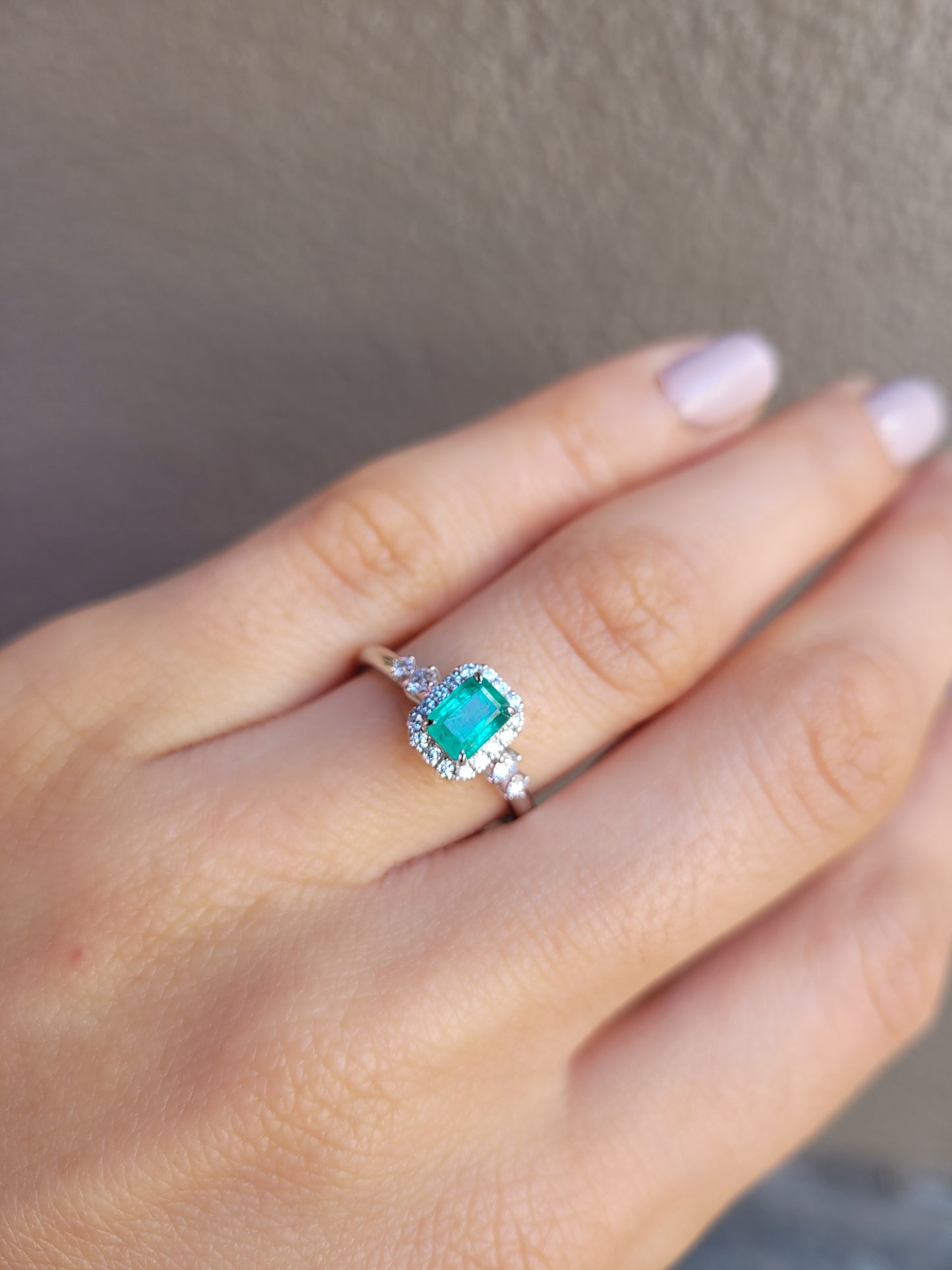 Natural Colombian Emerald and Diamond Halo Platinum Ring