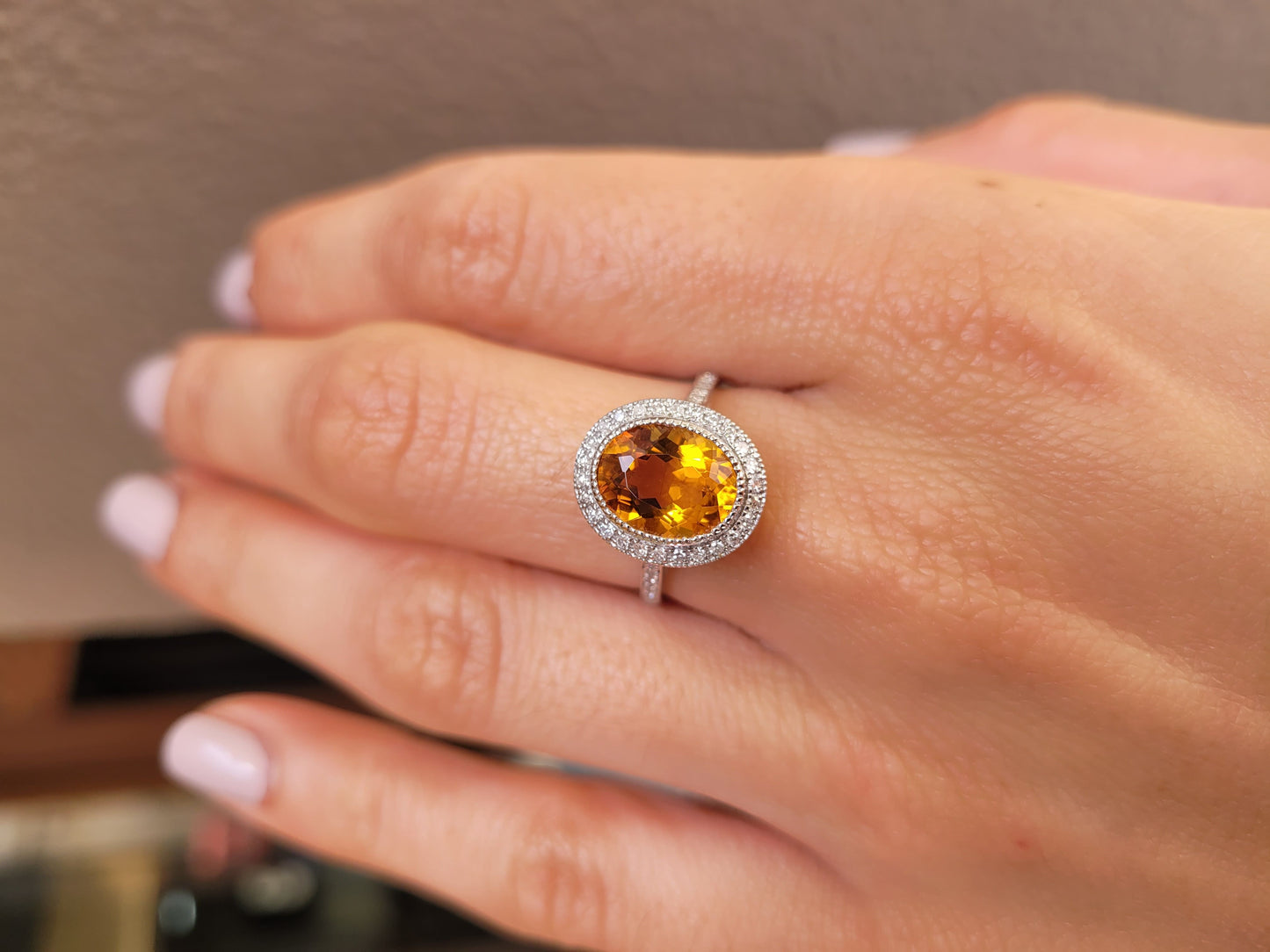 Oval-Cut Citrine Ring with Diamond Halo in 18K White Gold