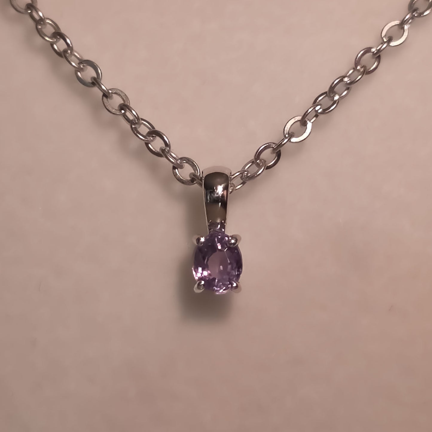view under incandescent light of Alexandrite Pendant in Platinum 950 - 0.18ct Apple Green Hue